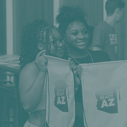 Two students holding College Ready AZ logo banners
